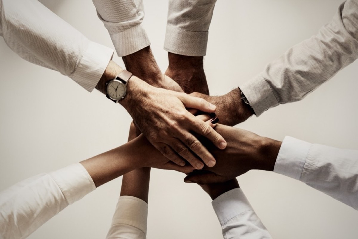 Hands joined together in a circle