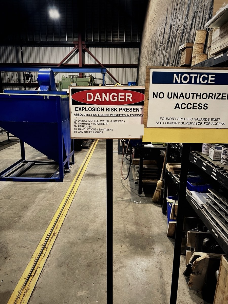 Danger and no unauthorized access signs in a plant