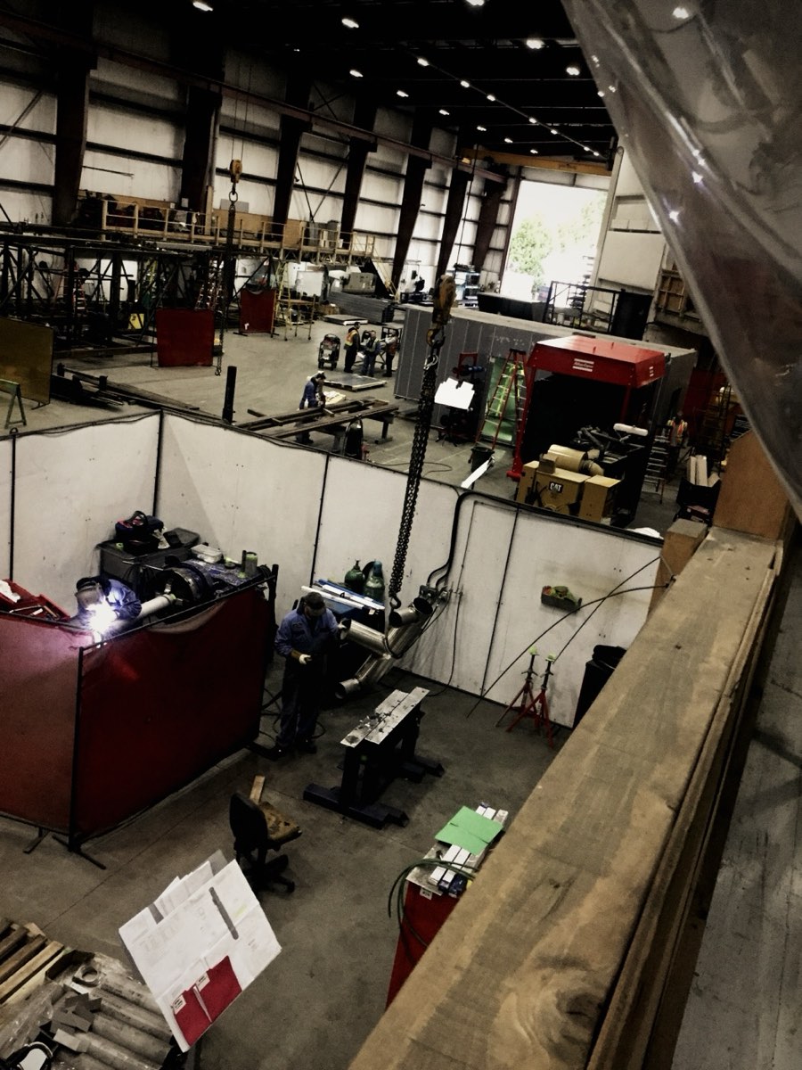 Looking down over a large fabrication shop floor