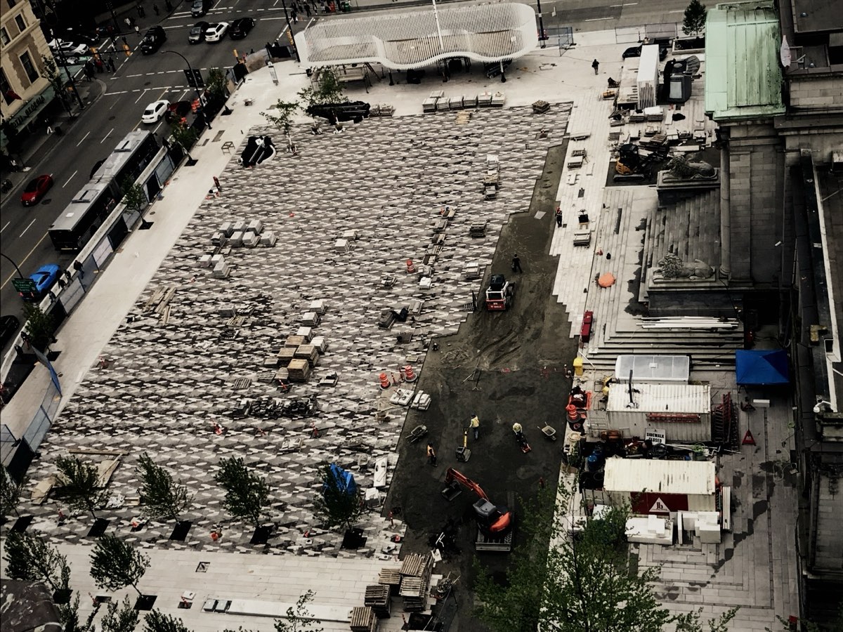 Aerial view of a downtown plaza under construction