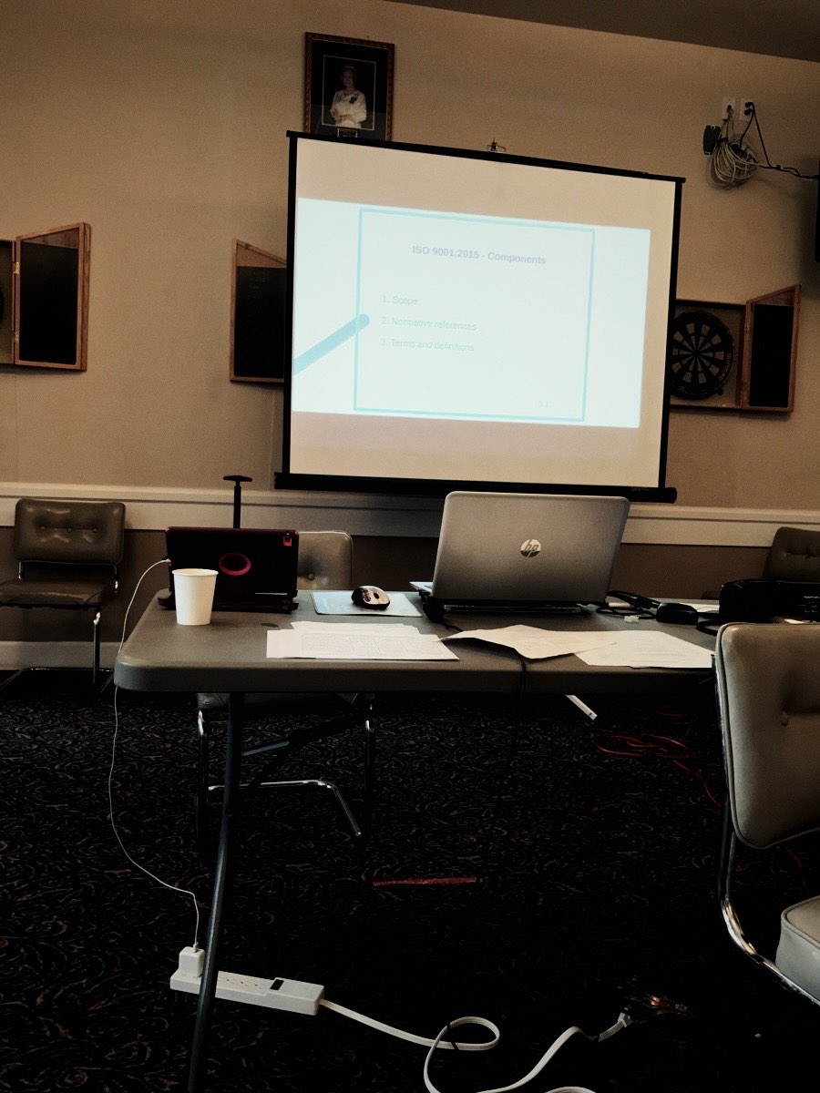 Training room set up with a projector screen
